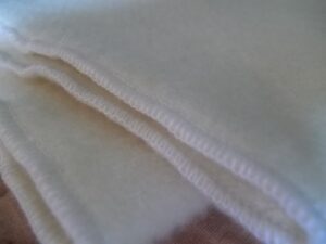 Organic Needle Punched Wool Puddle Pad Serged Edges